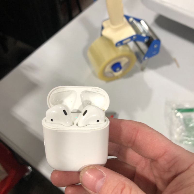 Photo 2 of Apple AirPods with Charging Case (Latest Model)