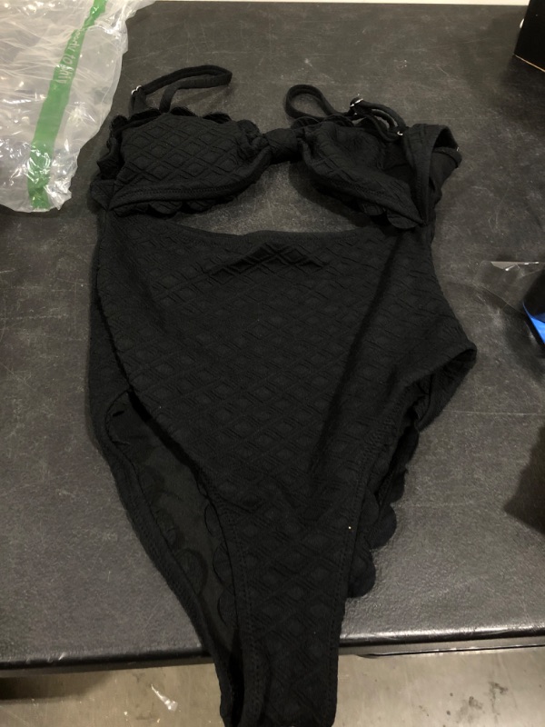 Photo 1 of black bathing suit unknown size seems like a m-L