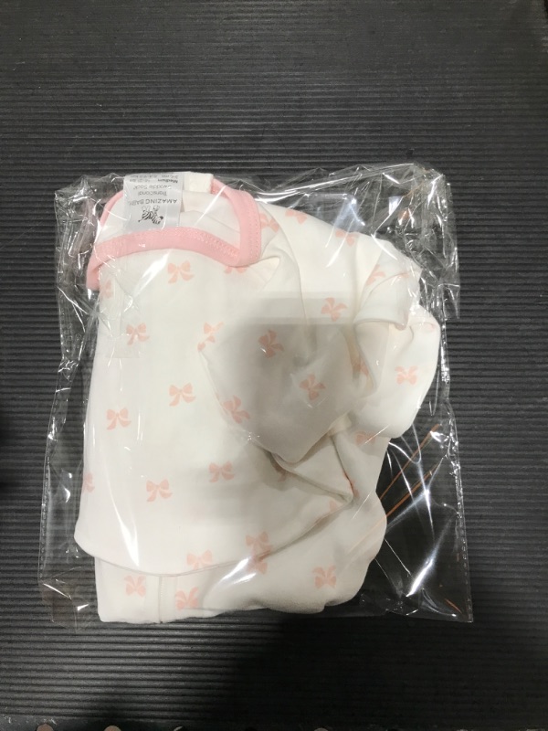 Photo 2 of Amazing Baby Transitional Swaddle Sack with Arms Up Half-Length Sleeves and Mitten Cuffs, Tiny Bows, Pink, Small, 0-3 months, 6-14 lbs (Better Sleep for Baby Girls, Easy Swaddle Transition)