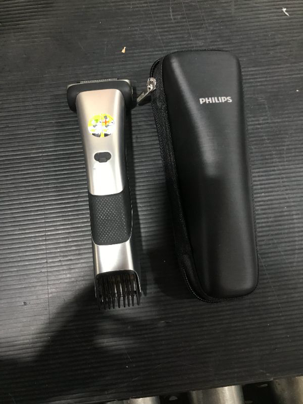 Photo 2 of Philips Norelco Bodygroom Series 7000 Showerproof Body Trimmer & Shaver with Case and Replacement Head, BG7040/42