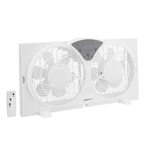 Photo 1 of Amazon Basics Digital Window Fan with Twin 9-Inch Reversible Airflow Blades and Remote Control
