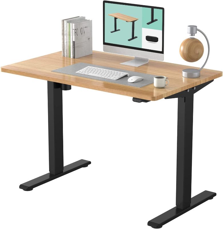 Photo 1 of Essential Electric Height Adjustable Standing Desk Heavy Duty Steel Stand Up Desk - Light oak and Black