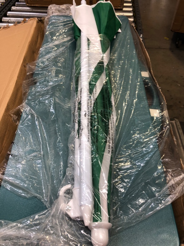 Photo 1 of *****MAJOR DAMAGE TO PACKAGING**** Stansport Picnic Table and Umbrella Combo Pack Green