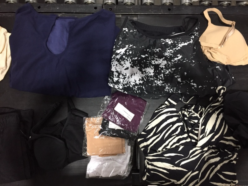 Photo 2 of  Clothing bundle with various types and sizes  ** All items sold as is** 