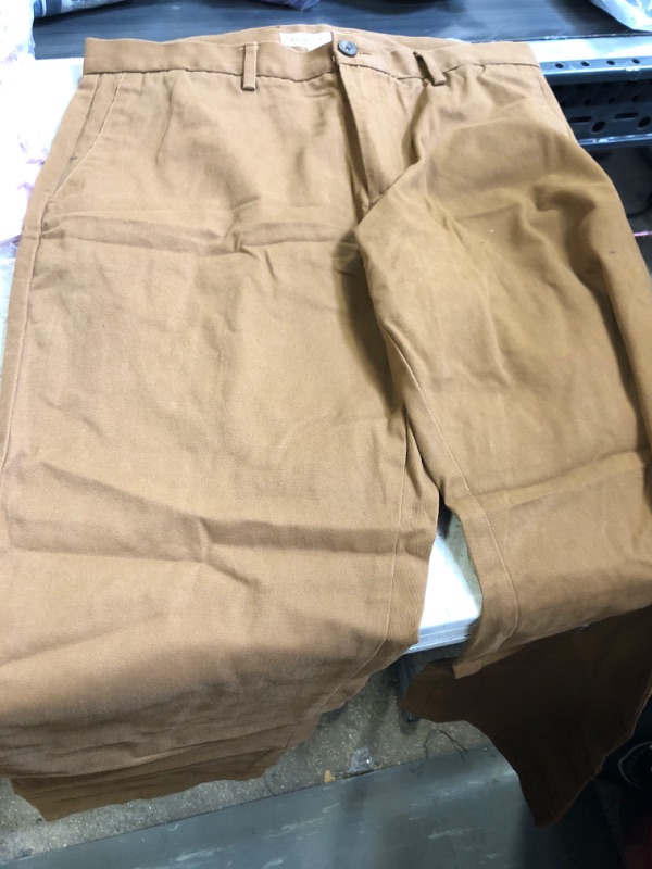 Photo 1 of Amazon Essentials Men's Classic-Fit Wrinkle-Resistant Flat-Front Chino Pant )SIZE  34W x 31L Dark Khaki Brown