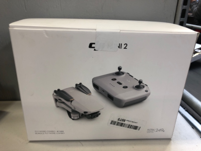 Photo 3 of DJI Mini 2 Fly More Combo Drone-----new item factory sealed -- dirty package during shipping