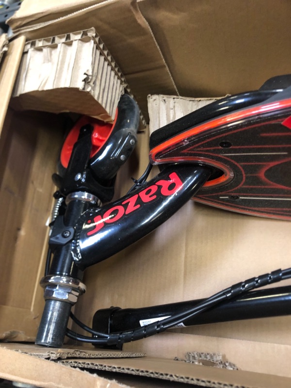 Photo 6 of Razor Power Core E90 Electric Scooter, Box Packaging Damage, Moderate Use, Scratches and Scuffs Found on Item, Hardware Loose in Box, Missing Hardware, Item Turned on, Did not Go or Glow. 
