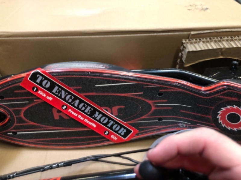 Photo 4 of Razor Power Core E90 Electric Scooter, Box Packaging Damage, Moderate Use, Scratches and Scuffs Found on Item, Hardware Loose in Box, Missing Hardware, Item Turned on, Did not Go or Glow. 
