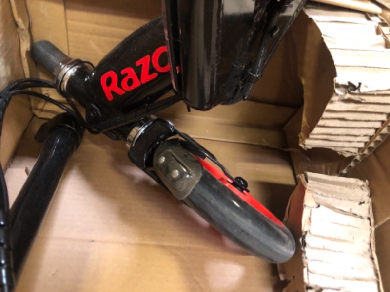Photo 12 of Razor Power Core E90 Electric Scooter, Box Packaging Damage, Moderate Use, Scratches and Scuffs Found on Item, Hardware Loose in Box, Missing Hardware, Item Turned on, Did not Go or Glow. 
