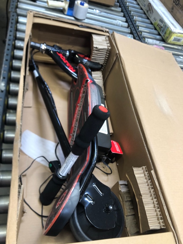 Photo 3 of Razor Power Core E90 Electric Scooter, Box Packaging Damage, Moderate Use, Scratches and Scuffs Found on Item, Hardware Loose in Box, Missing Hardware, Item Turned on, Did not Go or Glow. 
