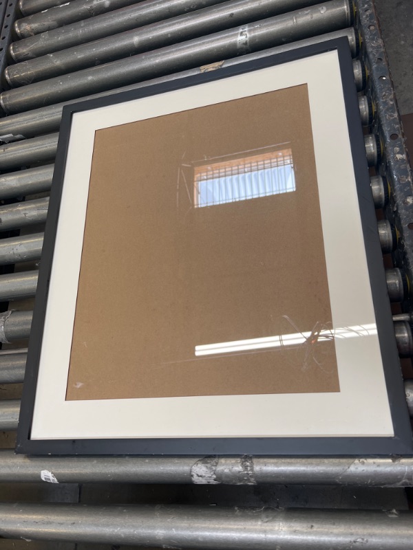 Photo 1 of 25X21 BLACK WOOD FRAME WITH GLASS, MINOR SCUFFS ON FRAME.