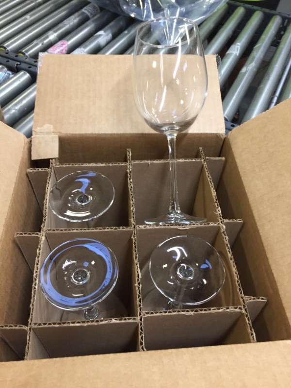 Photo 1 of 4Pc Wine Glass Set, Box Packaging Damaged, Moderate Use, Scratches and Scuffs on Item,
