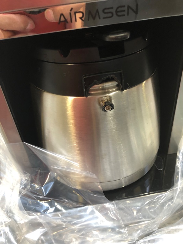 Photo 3 of AIRMSEN Drip Coffee Maker 8 Cup, Programmable Coffee Maker 4 Hours Warming Stainless Steel Coffee Machine with Thermal Carafe, Reusable Filter for Home and Office - CM1705WE------handle on coffee pot is broken--------used needs cleaning 