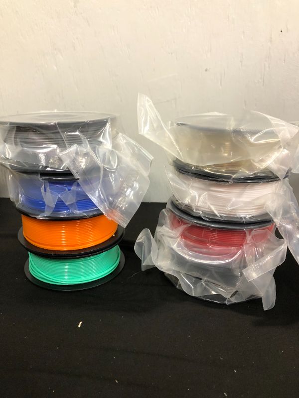 Photo 2 of SUNLU 250g PLA Filament 1.75mm, 3D Printer Filament, Dimensional Accuracy +/- 0.02 mm, 0.25 kg Spool, 8 Rolls, Black+White+Grey+Transparent+Red+Blue+Orange+Green