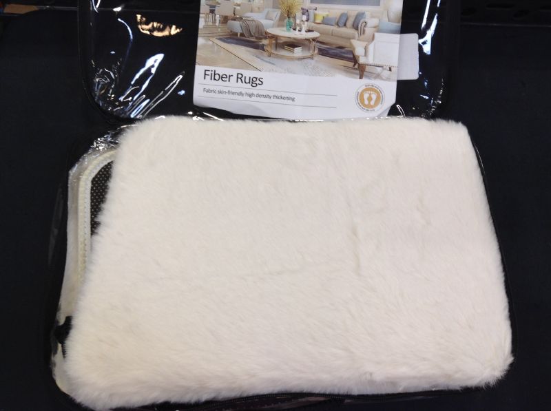 Photo 1 of HH Together Ultra Soft Faux Rabbit Fur Area Rug, Fluffy Faux Fur Rug, Faux Fur Area Rug for Bedroom Sofa Living Room Accent Rugs (31.520", White)
