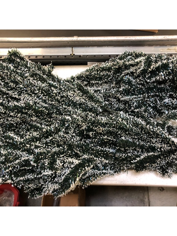 Photo 1 of 7ft  Artificial Christmas tree, Ornaments included.--Packaging damaged