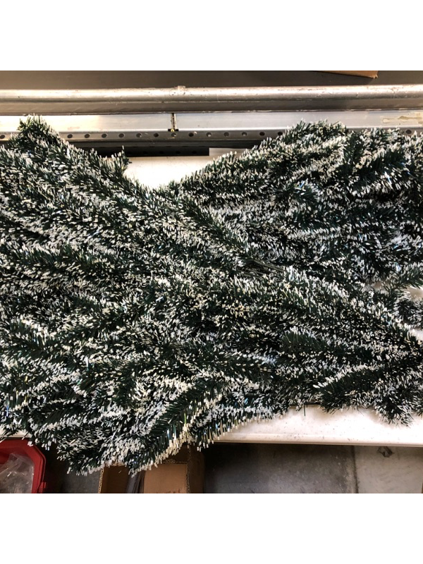 Photo 1 of 7ft Artificial Christmas Tree----Used--Ornaments included