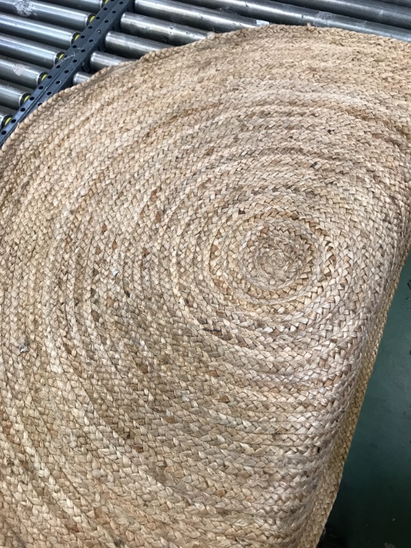 Photo 1 of 48" Braided oval rug-------used needs cleaning 