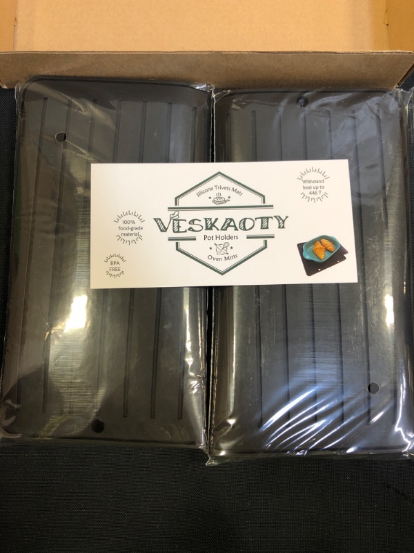 Photo 1 of "VESKAOTY" SILICONE TRIVET MATS 2PK
