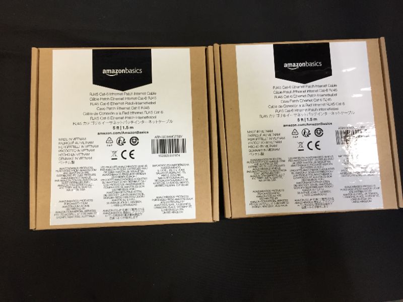 Photo 1 of Amazon Basics RJ45 Cat-6 Gigabit Ethernet Patch Internet Cable - 5 Foot - SET OF 2 -