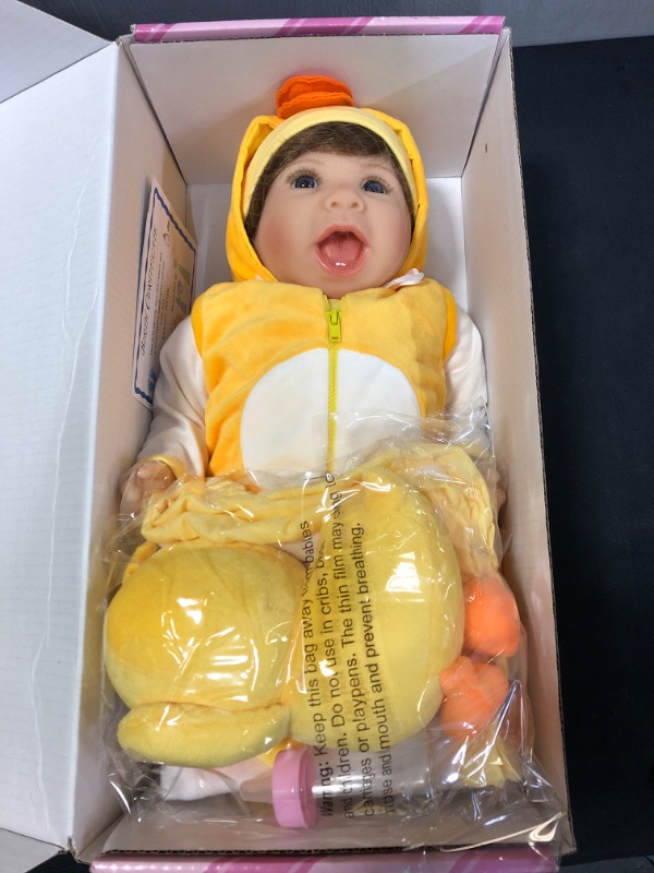 Photo 2 of Aori Lifelike Realistic Reborn Baby Dolls 22 Inch Weighted Reborn Girl Doll with Yellow Clothes and Duck Toy Accessories Best Birthday Set for Girls Age 3