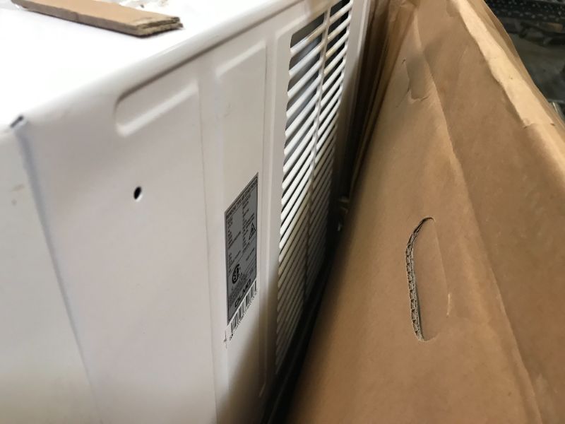Photo 2 of OLMO 18000 BTU Window Air Conditioner 11.8 CEER 208-230V with Remote Controller and Window Frame
