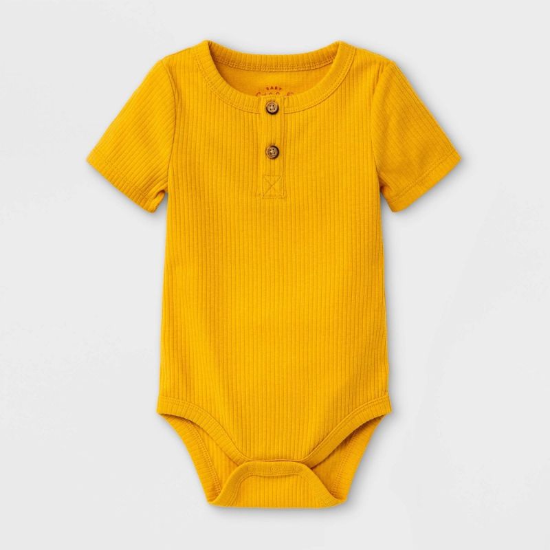 Photo 1 of Baby Boys' Rib Henley Bodysuit - Cat & Jack™ Mustard Yellow- Size- 3-6 months
