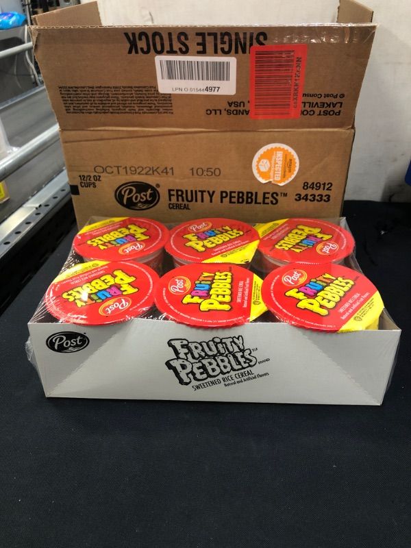 Photo 1 of 12 PACK OF 2 OZ FRUITY PEBBLES CEREAL CUPS ( EXP: 10/19/2022)