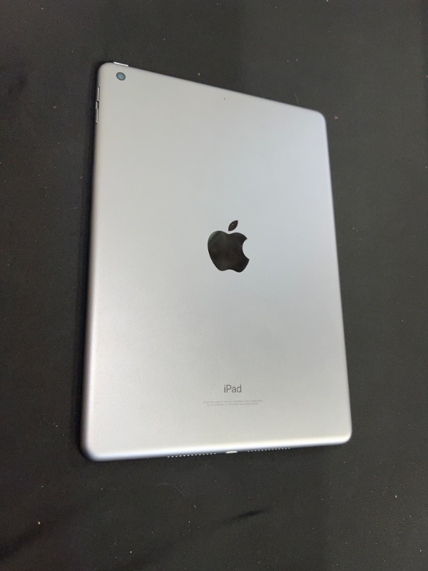 Photo 5 of IPAD 6TH GENERATION, MODEL #A1893 ( ITEM IS USED HAS SCRATCHES AND FINGERPRINTS THROUGHOUT. DOES NOT COME WITH BOX OR CHARGER)