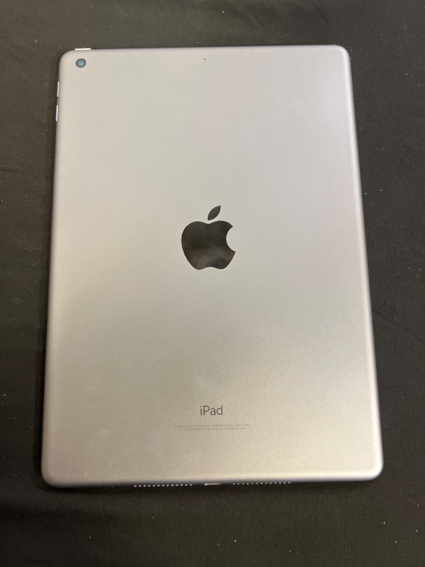 Photo 1 of IPAD 6TH GENERATION, MODEL #A1893 ( ITEM IS USED HAS SCRATCHES AND FINGERPRINTS THROUGHOUT. DOES NOT COME WITH BOX OR CHARGER)