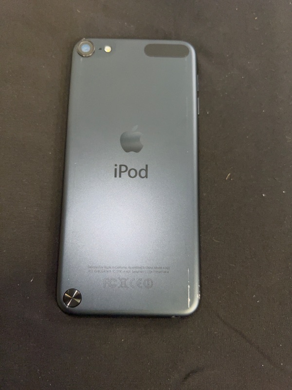 Photo 3 of IPOD TOUCH 5TH GENERATION MODEL A1421 DARK BLUE COLOR (ITEM IS USED, HAS SCRATCHES AND FINGERPRINTS THROUGHOUT. DOES NOT COME WITH BOX OR CHARGER)