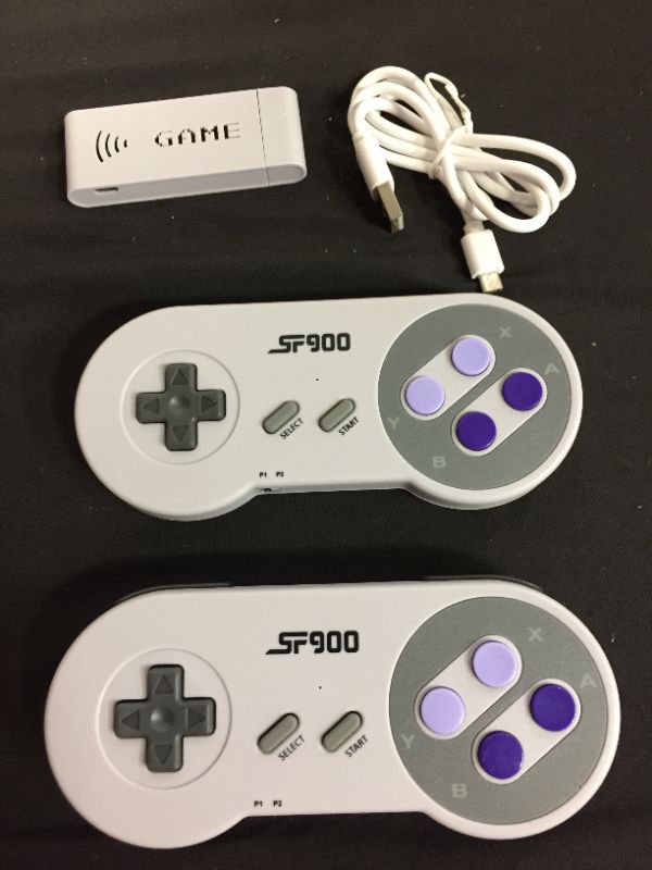 Photo 2 of Plug & Play Wireless Video Game SF900 16 Bit Classic Retro Video Games Console Dual 2.4G Wireless Gamepads Controllers for SEGA Stick Gaming (HD Quality & Support 2 Players)