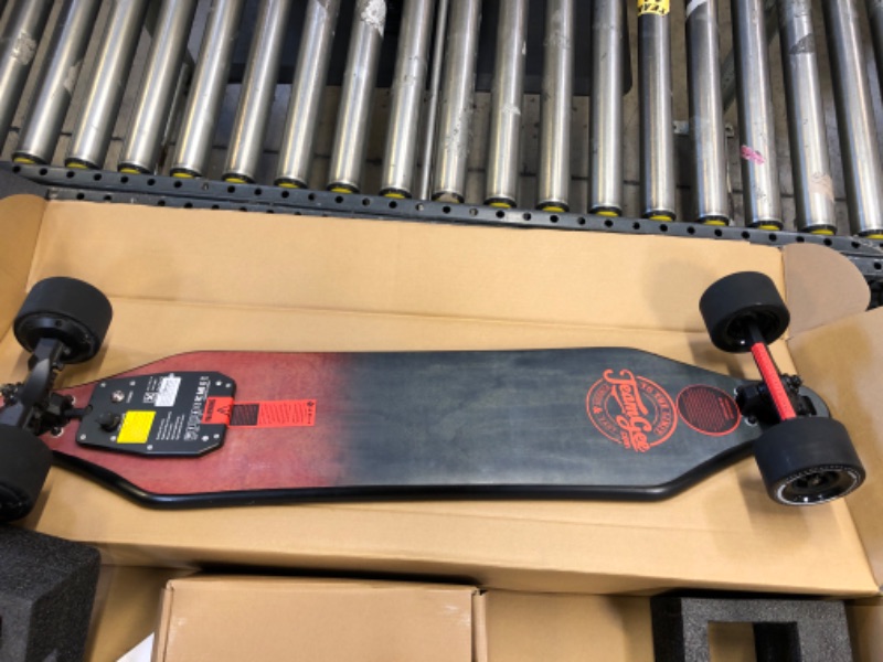 Photo 3 of Teamgee H5 38" Electric Skateboard with Remote, 760W Dual Motors, 22 MPH Top Speed, 13.7Lbs Long Board Hidden Battery the Thinnest Electric Longboard-----------------item has stains on griptape due to usage 