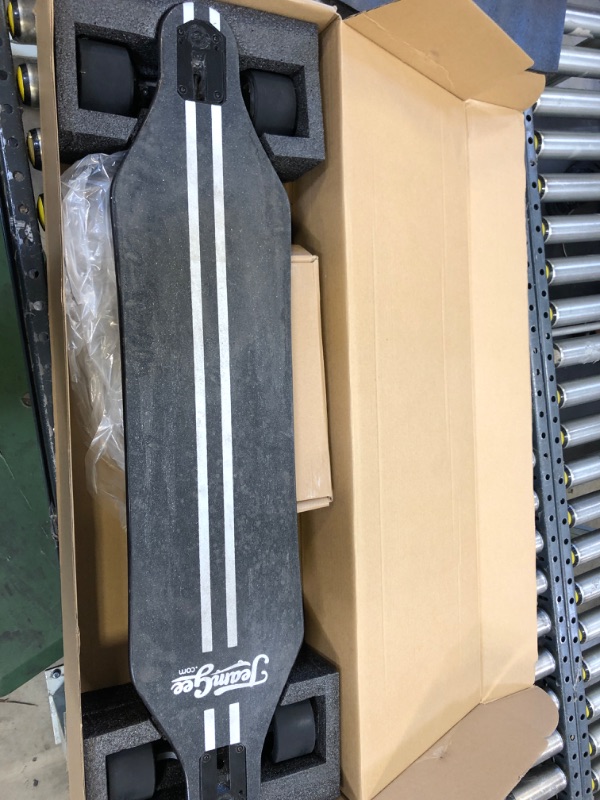 Photo 2 of Teamgee H5 38" Electric Skateboard with Remote, 760W Dual Motors, 22 MPH Top Speed, 13.7Lbs Long Board Hidden Battery the Thinnest Electric Longboard-----------------item has stains on griptape due to usage 