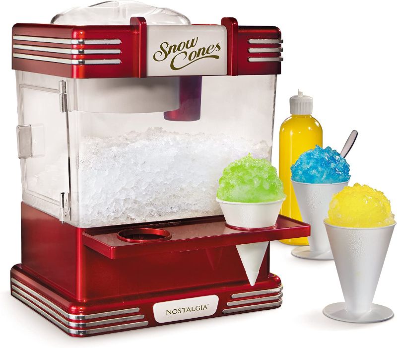 Photo 1 of Nostalgia RSM602 Countertop Snow Cone Maker Makes 20 Icy Treats, Includes 2 Reusable Plastic Cups & Ice Scoop, Retro Red
