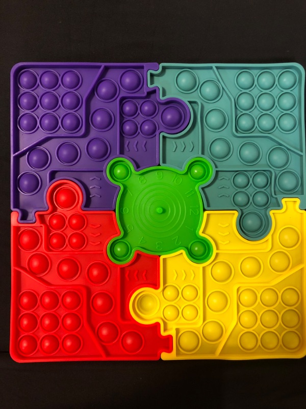 Photo 1 of 4 PIECE PUZZLE PUSH POP SENSORY TOY