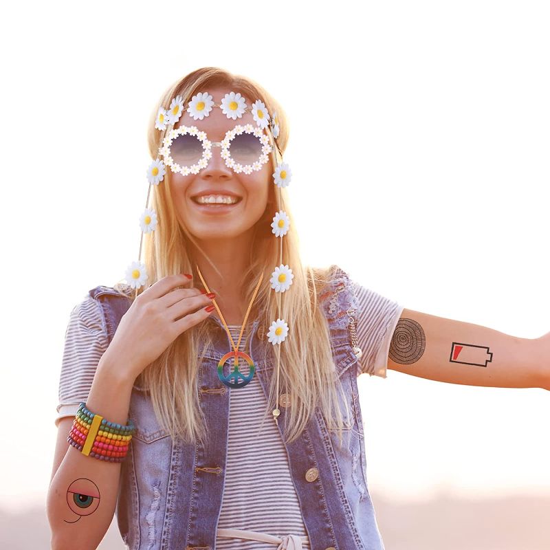 Photo 1 of 6 Pieces Women Hippie Costume Set 60s 70s Includes Sunflower Hair Band Floral Headband Peace Sign Necklace Hippie Style Peace Earrings Retro Daisy Sunglasses Temporary for Women Girls
