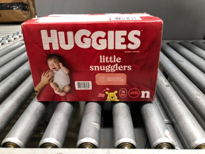 Photo 2 of Baby Diapers Size Newborn (up to 10 lbs), 76ct, Huggies Little Snugglers
