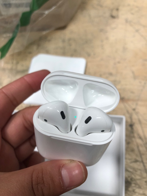 Photo 3 of Apple AirPods (2nd Generation) Wireless Earbuds with Lightning Charging Case Included. Over 24 Hours of Battery Life, Effortless Setup. Bluetooth Headphones for iPhone
