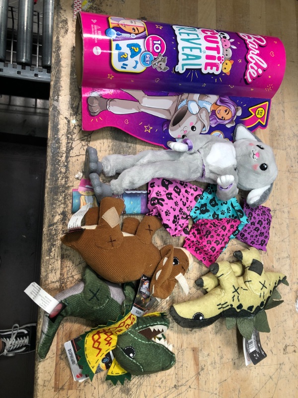 Photo 1 of bundle of 4 toys: Jurassic world plush dinosaurs, and Barbie cutie reveal 