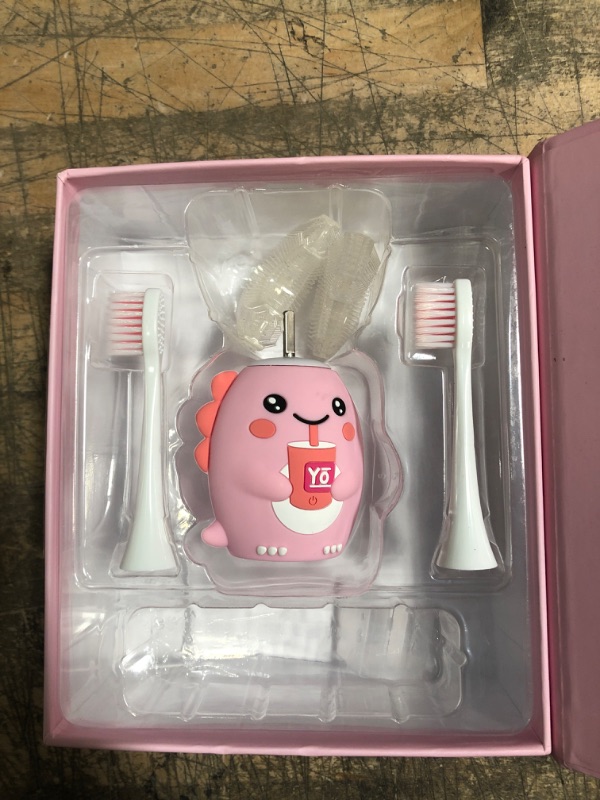 Photo 2 of Kids Electric Toothbrushes, U Shaped Ultrasonic Toothbrush ,Rechargeable Kids Toothbrush w/ Smart Timer, Sonic Toothbrush Kids with 6 Modes, IPX7 Waterproof Design (8-15 Year Old, Pink0 *Missing Charger*