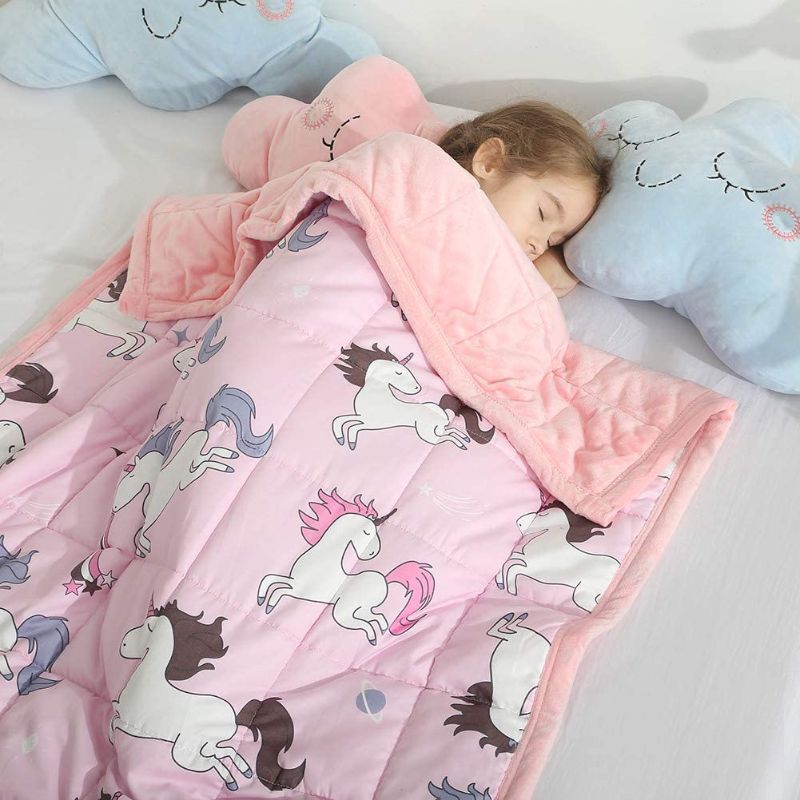 Photo 1 of HAOWANER Minky Kids Weighted Blanket 5lbs 36 x 48 inches, Soft Kids and Toddler Comforter Great for Calming and Sleeping, Child Bed Size, Pink Unicorn
