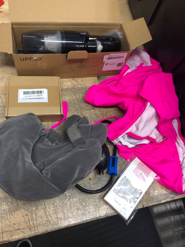 Photo 1 of ** MISCELLANEOUS BUNDLE***  5  ITEMS 
womens 2 piece bathing suit, neck pillow pump, mini hand vacuum etc
