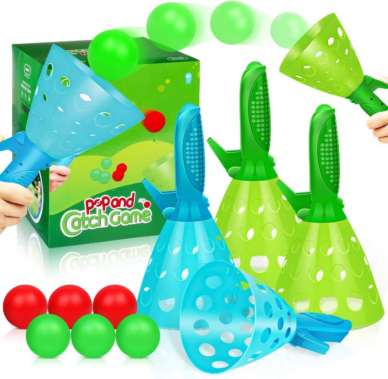 Photo 1 of Outdoor Indoor Game Activities for Kids, Pop-Pass-Catch Ball Game with 4 Catch Launcher Baskets and 6 Balls, Birthday Party Favors Gifts Summer Beach Sport Toys for Kids Age 5 6 7 8 9 10+ and Adults
