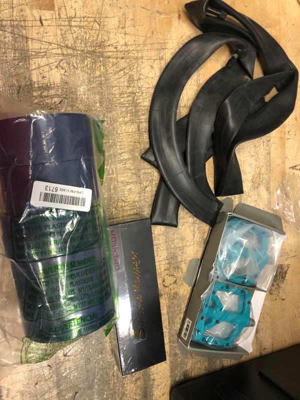 Photo 1 of ** MISCELLANEOUS BUNDLE***  4  ITEMS 
TAPE ROLLS, BIKE TIRE TUBES, BIKE PEDALS 
