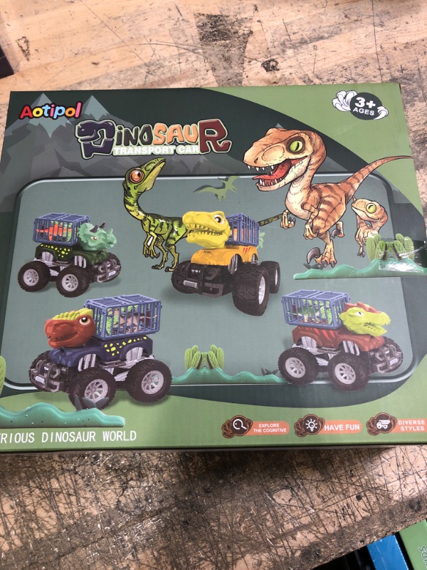 Photo 2 of Dinosaur Transport Truck Playset for Kids 3-7, Carrier Truck with Dinosaur Toys for Boys and Girls,Back Dinosaur Cars, 4 Dinosaur Toys and 8 Pieces Dinosaur, Dino Car Playset Toys
