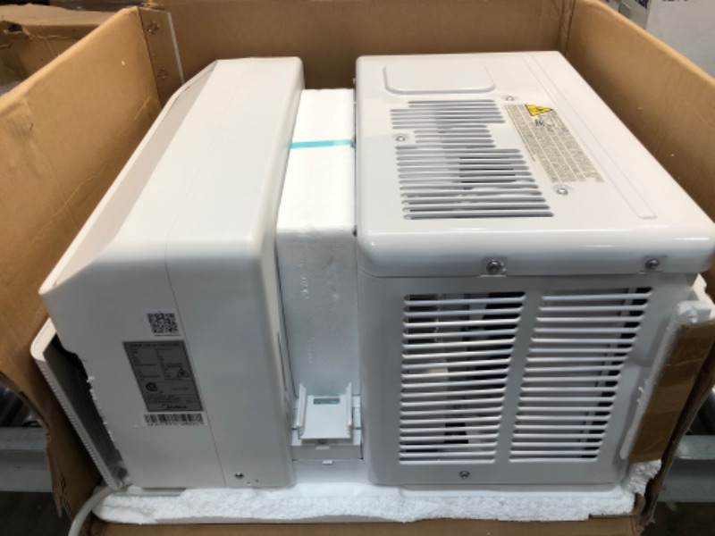 Photo 2 of TESTED BLOWS COLD AC*
Midea 8,000 BTU U-Shaped Smart Inverter Window Air Conditioner–Cools up to 350 Sq. Ft., Ultra Quiet with Open Window Flexibility, Works with Alexa/Google Assistant, 35% Energy Savings, Remote Control
