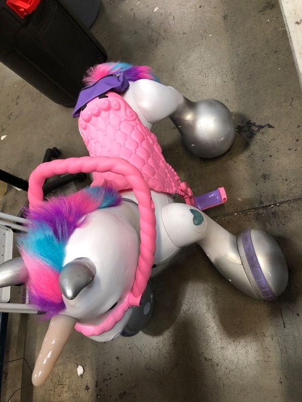Photo 1 of TESTED WORKS*
Kid Trax Toddler/Kids Rideamal Unicorn 12 Volt Ride On Toy, Max Rider Weight of 70lbs, Interactive, Responds with Movement, Lights, and Sound, Accessories Included , White