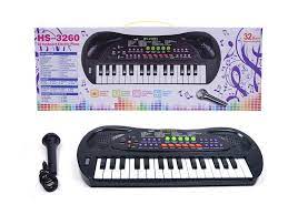 Photo 1 of 32 key multifunction elec plano with microphone, charger included" - Musical toys - X-Hong International Group