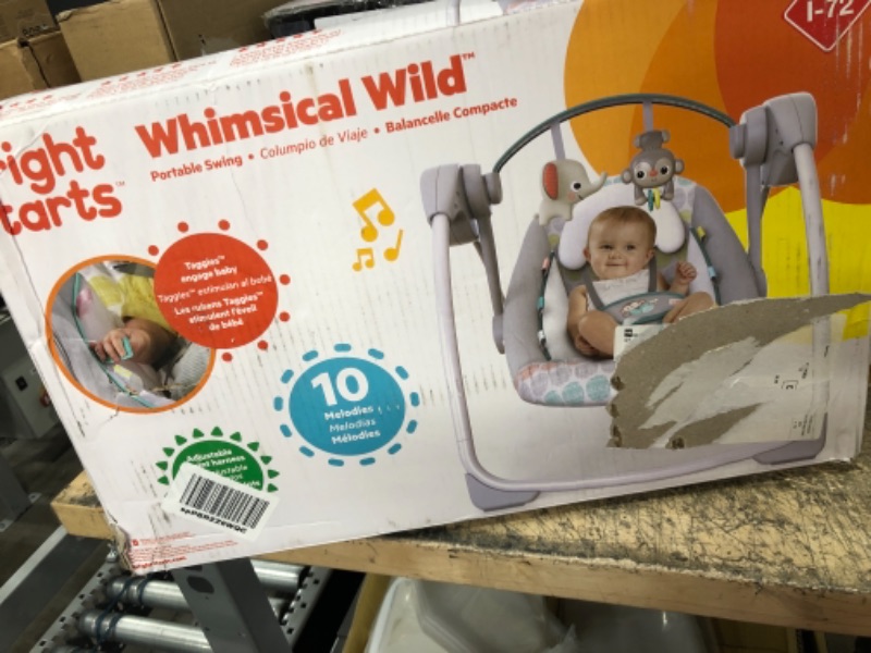 Photo 2 of Bright Starts Whimsical Wild Portable Swing